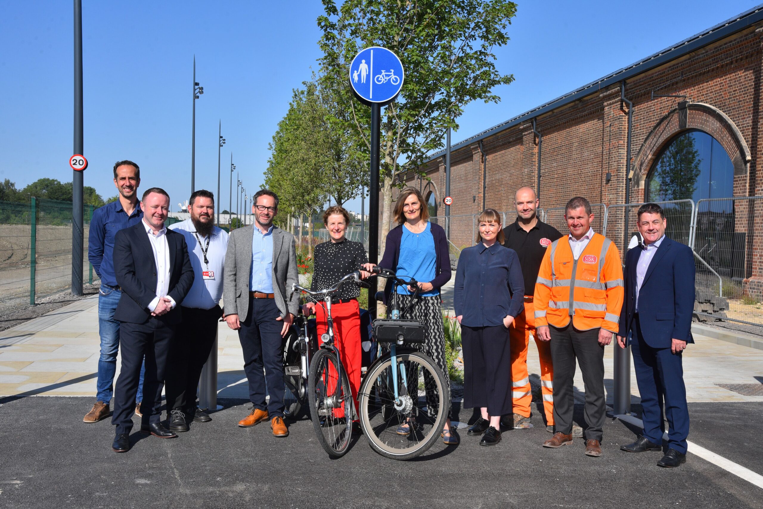 Members of the York Central Partnership celebrating the new route with a team photo and bikes